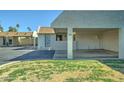 Charming home showcasing its covered parking and well-maintained front lawn at 5213 S Monaco Dr, Tempe, AZ 85283