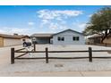 Beautiful single-story house with charming desert landscaping and spacious carport at 1101 E Cheryl Dr, Phoenix, AZ 85020