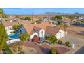 Aerial view showcasing a pool, lush landscaping and a seating area, perfect for outdoor enjoyment and relaxation at 2020 E Norwood St, Mesa, AZ 85213