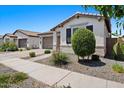 Charming home with desert landscaping and shuttered windows at 20886 E Sparrow Dr, Queen Creek, AZ 85142