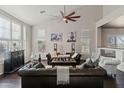 Spacious living room featuring high ceilings, a ceiling fan, and lots of natural light at 4534 E Oberlin Way, Cave Creek, AZ 85331