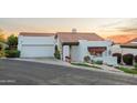 Charming home with a red tile roof, two-car garage, and lovely desert landscaping at 6188 N 29Th Pl, Phoenix, AZ 85016