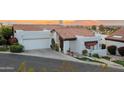 Exterior view of the house with a red tile roof and desert landscaping at 6188 N 29Th Pl, Phoenix, AZ 85016