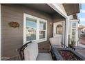 Cozy front porch with comfortable seating, perfect for relaxing and enjoying the neighborhood at 650 N Hawes Rd # 3607, Mesa, AZ 85207