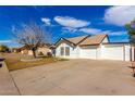 Charming single-story home with attached garage and a well-maintained front yard at 7326 W Georgia Ave, Glendale, AZ 85303