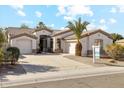 Beautiful single-story home with two-car garage, desert landscaping, and tile roof at 1653 W Morelos St, Chandler, AZ 85224