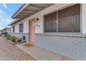 Close up of the front entrance and showing the pink front door at 248 S 95Th Pl, Chandler, AZ 85224