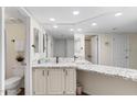 Bathroom featuring a spacious vanity with granite countertop and modern fixtures at 4141 N 31St St # 405, Phoenix, AZ 85016