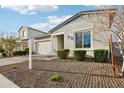 Inviting single-story home with a two-car garage and low-maintenance desert landscaping at 4370 E Kaibab Pl, Chandler, AZ 85249