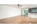 Spacious living room with bright windows and a view to the modern kitchen at 4735 N 24Th St, Phoenix, AZ 85016