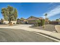 Beautiful single-story home featuring desert landscaping, a two-car garage, and a well-maintained exterior at 5225 S Opal Pl, Chandler, AZ 85249