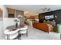 Open-concept living area featuring a modern dining space and kitchen at 651 N Ironwood Dr # 2, Apache Junction, AZ 85120