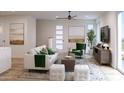 Bright and stylish living room with a large window and contemporary furnishings at 651 N Ironwood Dr # 4, Apache Junction, AZ 85120