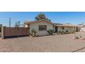 Attractive single-story home with desert landscaping for easy maintenance at 11468 N Desert Hills Dr, Sun City, AZ 85351