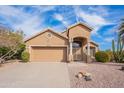 Charming single-Gathering home with a well-maintained front yard, desert landscaping, and a two-car garage at 15237 S 47Th Way, Phoenix, AZ 85044