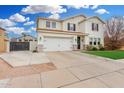 Beautiful two-story home with a spacious driveway and a two car garage at 3760 E Cotton Ct, Gilbert, AZ 85234