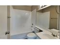 Bright bathroom featuring a white vanity, mirrored medicine cabinet, and a shower-tub combination at 625 S Westwood St # 108, Mesa, AZ 85210