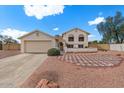 Charming single-Gathering home featuring a well-maintained yard, large driveway and a two-car garage at 6915 E Gary Cir, Mesa, AZ 85207