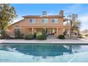 Inviting backyard featuring a sparkling pool and a spacious patio area at 7100 E Montgomery Rd, Scottsdale, AZ 85266