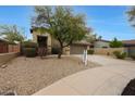 Charming desert landscape with a two-story home and a desert landscape at 10212 E Betony Dr, Scottsdale, AZ 85255