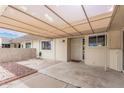 Relaxing covered patio with ample space for outdoor seating and entertaining at 11139 W Cameo Dr, Sun City, AZ 85351