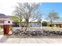 Charming single-story home featuring desert landscaping with cactus and rock features in a desirable neighborhood at 1515 E Sunnyslope Ln, Phoenix, AZ 85020