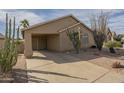 Charming one-story home with a covered carport, desert landscaping, and a well-maintained front yard at 1793 E Desert Inn Dr, Chandler, AZ 85249