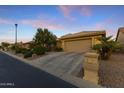 Desert home with 2 car garage and desert landscaping at 3711 N 162Nd Ln, Goodyear, AZ 85395