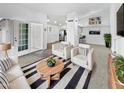 Bright living room with a stylish rug, comfortable seating, and modern decor for cozy gatherings and relaxation at 4233 E Covina St, Mesa, AZ 85205