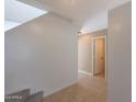 Hallway featuring tile floors and stairs at 509 W Princeton Ave, Gilbert, AZ 85233