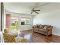 Bright living room showcasing hardwood floors, seating, and ample natural light at 8355 E Thomas Rd, Scottsdale, AZ 85251