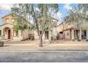 Charming home exterior featuring a cozy, two-story design and landscaped front yard at 110 N 66Th Ave, Phoenix, AZ 85043