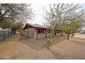 Spacious backyard features desert landscaping and a secure black metal fence at 13439 N 16Th Ave, Phoenix, AZ 85029