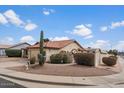 Lovely single-story home featuring desert landscaping, a tile roof, and private front courtyard at 1651 E Kielly Ln, Casa Grande, AZ 85122