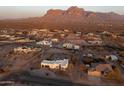 Scenic aerial view of a desert neighborhood with stunning mountain views at 1775 N Starr Rd, Apache Junction, AZ 85119