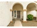 Welcoming arched entryway with decorative pillars leading to the front door at 1930 S Westwood Dr # 29, Mesa, AZ 85210