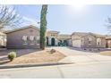 Charming single-story home featuring a well-manicured front yard and a welcoming entrance at 20187 E Sonoqui Blvd, Queen Creek, AZ 85142