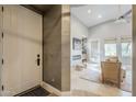 Welcoming entryway with textured walls and a view into the living area at 20704 N 90Th Pl # 1065, Scottsdale, AZ 85255