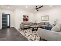 Bright living room showcasing contemporary design, recessed lighting and stylish decor at 2227 W Cambridge Ave, Phoenix, AZ 85009