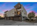 Contemporary townhome with clean lines, balcony, and attached two-car garage at 3106 N 70Th St # 2003, Scottsdale, AZ 85251