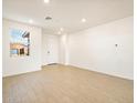 Inviting living room with tile floors, white walls, and lots of light at 4324 W Jeanette Ln, San Tan Valley, AZ 85144