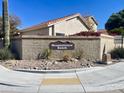 Street view of the 'Mountainview Ranch' community sign with stucco wall and a cactus in the background at 13517 N 102Nd Pl, Scottsdale, AZ 85260