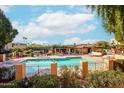 Inviting community pool with lounge chairs and covered seating area provides a resort-like atmosphere at 3031 N Civic Center Plz # 261, Scottsdale, AZ 85251