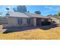 This single-story brick home has a well-maintained lawn and a classic design, perfect for comfortable living at 4547 W Villa Theresa Dr, Glendale, AZ 85308