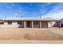 A cozy single-level home with a covered entrance and driveway, offering a blend of comfort and convenience at 4813 N 62Nd Ave, Phoenix, AZ 85033