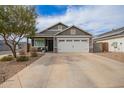 Inviting single-Gathering home with a neatly maintained yard and an attached two-car garage at 5030 S 23Rd Ave, Phoenix, AZ 85041