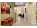 Bright foyer with tile flooring leads to the dining room and second floor at 7445 E Eagle Crest Dr # 1094, Mesa, AZ 85207
