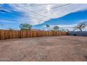 Spacious backyard with a new wood fence, ready for outdoor living and recreation at 1137 E Mcmurray Blvd, Casa Grande, AZ 85122