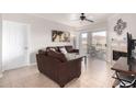 Bright living room with a ceiling fan and tile floors at 16013 S Desert Foothills Pkwy # 2082, Phoenix, AZ 85048