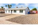 Picture of a beautiful single story home, featuring neutral paint and gravel landscaping at 1640 W Charleston Ave, Phoenix, AZ 85023